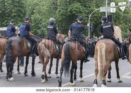 Kyiv, Ukraine - June 23, 2019. Mounted Police On The Road In The City
