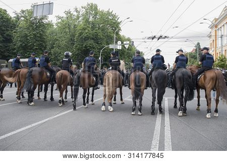 Kyiv, Ukraine - June 23, 2019. Mounted Police On The Road In The City