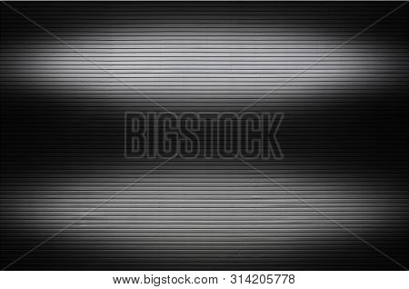 Metal Wall With Invisible Light Sources That Illuminate The Midd