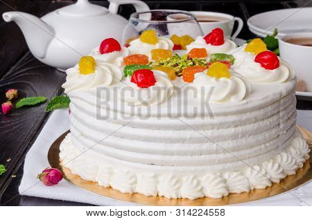 Sicilian Cassata Cake With Candied Fruits, Pistachios And Chocolate. Traditional Italian Easter Cake