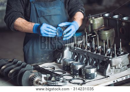 Master Collects A Rebuilt Motor For The Car
