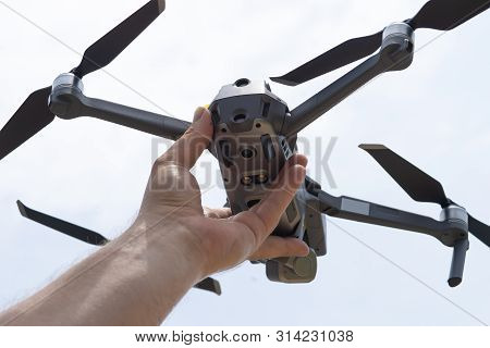 Female Hand Launches Drone For Flight, With Which You Can Take Photos And Video Filming