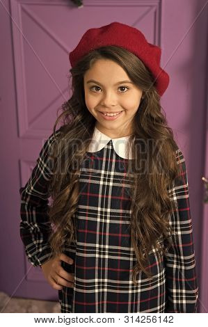 French Style Beret Hat. How Wear Beret Like Fashion Girl. Kid Little Girl With Long Hair Posing In H