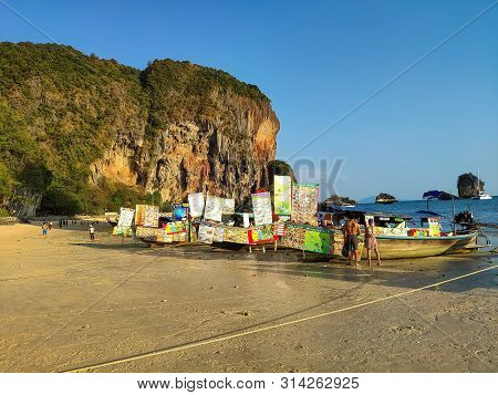 Thailand, Krabi Aonang Beach- February 19, 2019: Floating Food Market. Boats With Fast Food Ashore