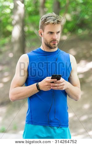 Set Up Route For Run Using Application. Man Smartphone Ready To Start Jog. Set Up Application. Sport
