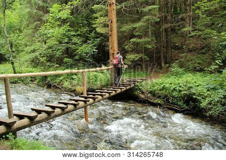 A Tourist In The Beautiful Gorges Of The Slovak Paradise National Park
