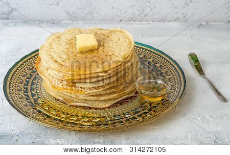 Moroccan Pancakes Baghrir  Beghrir Or Crapes With 1000 Holes Served With Honey And Butter On Grey Ba
