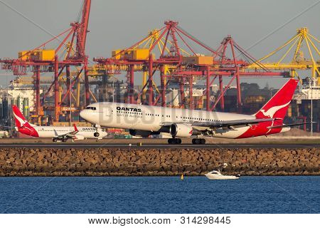 Sydney, Australia - October 9, 2013: Qantas Boeing 767 Airliner Landing At Sydney Airport.