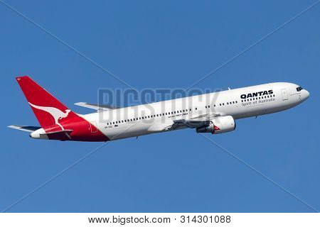 Sydney, Australia - October 8, 2013: Qantas Boeing 767 Airliner Taking Off From Sydney Airport.