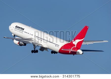 Sydney, Australia - October 7, 2013: Qantas Boeing 767 Airliner Taking Off From Sydney Airport.