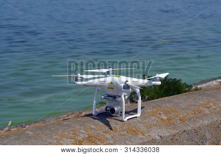 Drone quadrocopter DJI Phantom 3 Pro explores storage pool of hydroelectric station. After Chernobyl disaster - collection active sediments. Dnepr river. July 29, 2019.Kiev ,Ukraine 