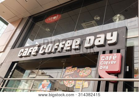 Bengaluru, India June 27, 2019 : Front View Bill Board Of Cafe Coffee Day Shop Building At Bengaluru
