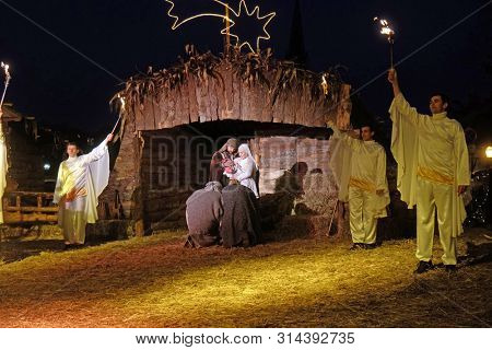ZAGREB, CROATIA - DECEMBER 20, 2016: The religious spirit in the Advent in Zagreb especially can feel the front of the Cathedral, where Community Cenacolo organizes live Christmas nativity scene.