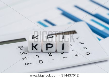 Key Performance Indicator, Kpi Measurement To Evaluate Business Success, White Cube Block With Alpha