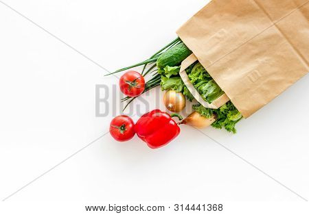 Healthy Food With Fresh Vegetables In Paper Bag On White Background Top View Space For Text