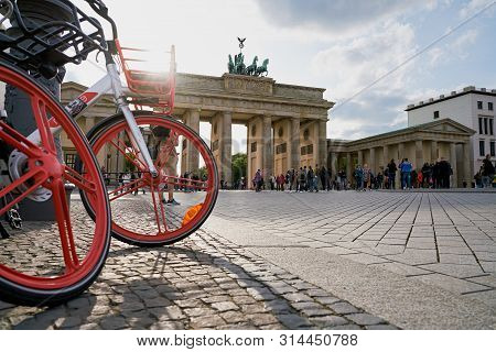 Berlin, Germany - April 28, 2019: Bicycles Of The Chinese Company Mobike In Front Of The Brandenburg