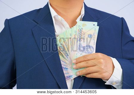 Money In Vietnam Hold On Hand Business Man Wearing A Blue Suit (socialist Republic Of Vietnam), Dong