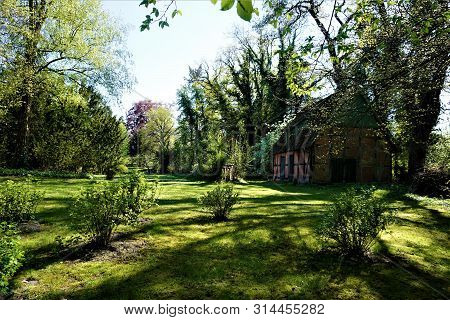 A Large Garden With Half-timbered Brick House In The Park Surrounding Wienhausen Abbey