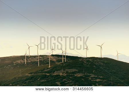 Power Generation Eolic Wind Turbines Field In Spain
