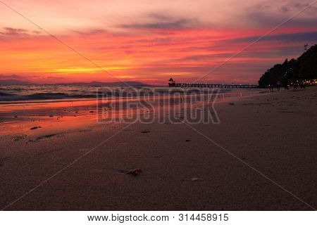 View Of Beautiful Sky Of Sea And Wave That Are Breaking Into The Beach And  Reflection Of The Sky At