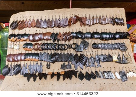 Beautiful Wooden Earrings Being Sold On Open Air Market Feima In Maputo, Mozambique
