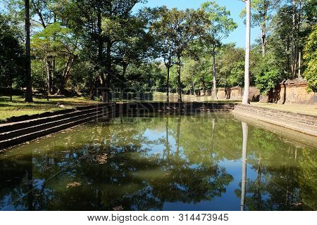 Man-made Lake, The Coast And Bottom Of Which Are Lined With Stone. The Ancient Khmer Reservoir. Bara