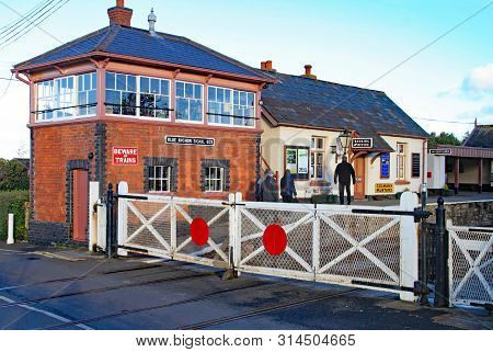 Blue Anchor, Somerset, England - November 11th 2012: The Signal Box And Level Crossing Gates At Blue