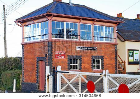 Blue Anchor, Somerset, England - November 11th 2012: The Signal Box And Level Crossing Gates At Blue