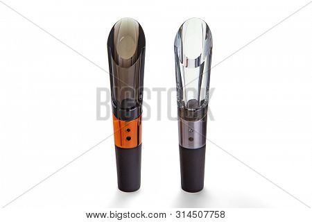 Wine pourer and wine stopper on white background