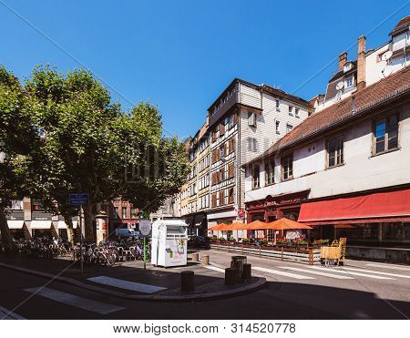 Strasbourg, France - Jun 16, 2018: Place Des Etudiants Street With Shops, Cintra Bar With Empty Terr