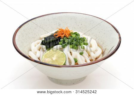 Japanese Bukkake Udon Noodles In A Ceramic Bowl On White Background
