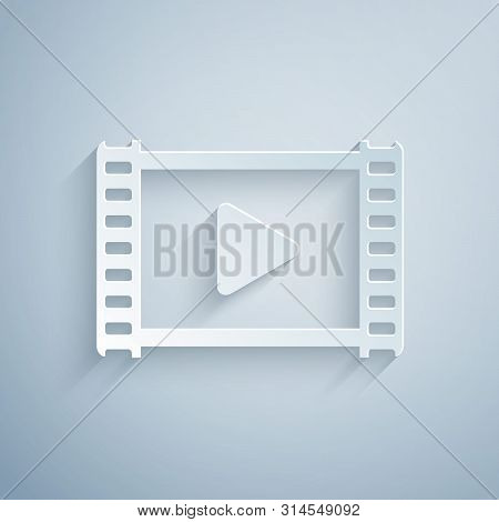 Paper Cut Play Video Icon Isolated On Grey Background. Film Strip With Play Sign. Paper Art Style. V