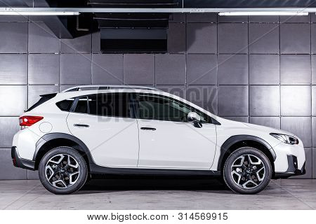 Novosibirsk, Russia - June 30, 2019: White Subaru Impreza Xv,  Side View.  Photography Of A Modern C