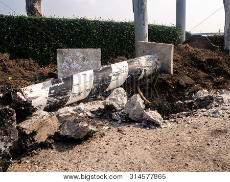 The Road Repairing Works With Jackhammer. Machine Drills Asphalt