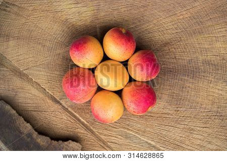 Apricot Fruit. Fresh Apricots On A Wooden Background. Close Up Flat Lay Photography