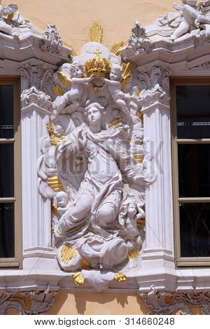WURZBURG, GERMANY - JULY O4, 2018: Virgin Mary, House of Falcon, the finest Rococo style building in the Wurzburg, Germany
