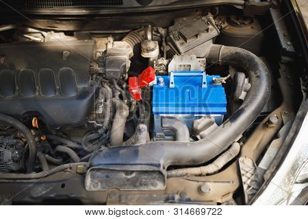 new lead-acid automotive electric battery replacement in old car