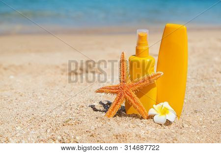Sunblock On The Beach. Sun Protection. Selective Focus.