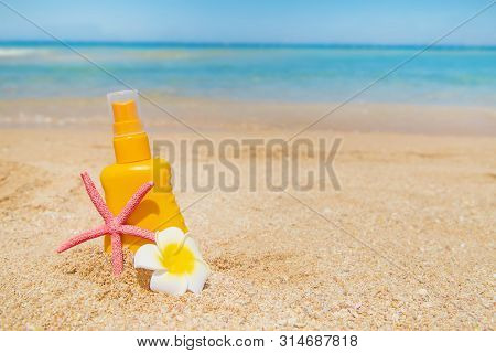 Sunblock On The Beach. Sun Protection. Selective Focus.