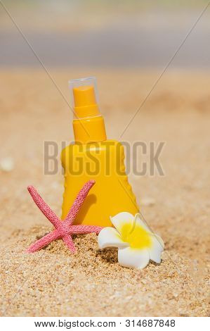 Sunblock On The Beach. Sun Protection. Selective Focus.