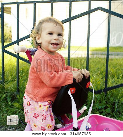 Little Girl Outside Walking At Playgarden, Lifestyle People Concept