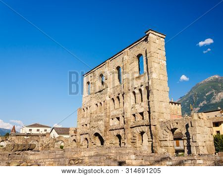 Aosta, Italy-june 17,2019: The Roman Theather Of Aosta Is Of Roman Period With A Facade Pierced By A