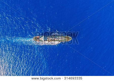 Oil Chemical Tanker Sails Blue Sea. Aerial Top View