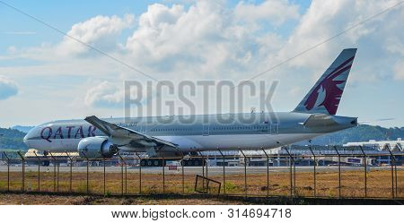 Phuket, Thailand - Apr 5, 2019. Qatar Airways A7-baz (boeing 777-300er) Taxiing On Runway Of Phuket 