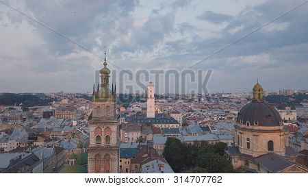 Aerial Roofs And Streets Old City Lviv, Ukraine. Central Part Of Old European City In Morning. Panor