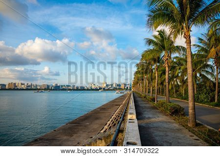 Sanya Town Evening Cityscape, View From Phoenix Island On Hainan Island In China
