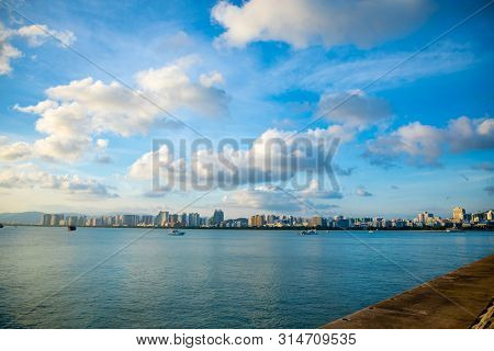 Sanya Town Evening Cityscape, View From Phoenix Island On Hainan Island In China