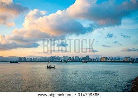 Sanya Town Evening Cityscape, View From Phoenix Island On Hainan Island In China