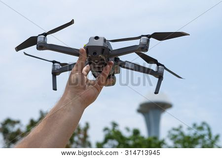 Female Hand Launches Drone For Flight, With Which You Can Take Photos And Video Filming, Close-up.
