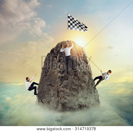 Businessmen Try To Reach The Goal. Difficult Career And Conpetition Concept.